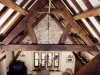Dramatic lit traditional oak beamed roof by SEEC