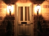 Front door simple black bracket lanterns